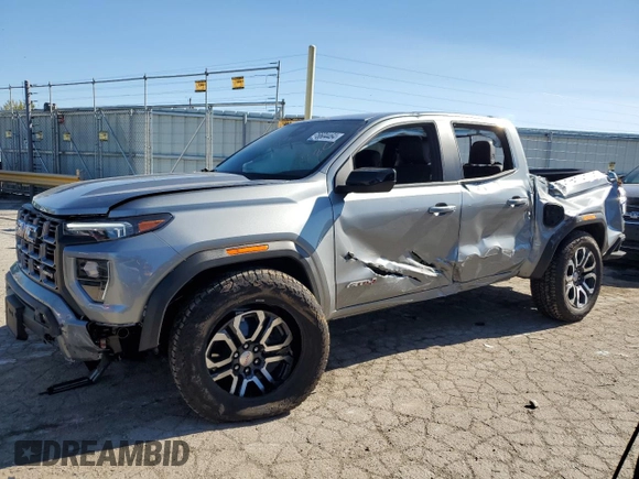 2024 GMC Canyon 4WD AT4 with VIN 1GTP6DEK8R1264699, listed as a Copart auction lot 76604464 with 2,406 mi miles and Salvage Title. Bid and sale history available at carsss.com. Image 1.