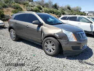 2015 Cadillac SRX Luxury Collection z VIN 3GYFNBE35FS555046, wystawiony jako Copart lot #57589155 z przebiegiem 108 456 mil mil oraz Szkoda całkowita • Salvage title. Historia ofert i sprzedaży dostępna na DreamBid. Obrazek 4.