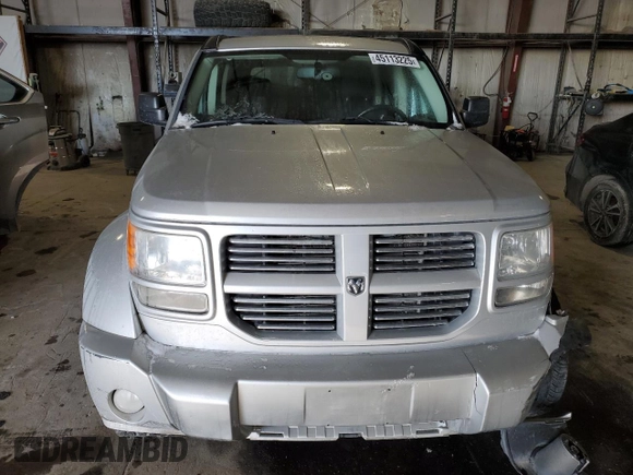 2010 Dodge Nitro SXT z VIN 1D4PU5GK7AW112562, wystawiony jako Copart lot #45113225 z przebiegiem 150 183 mil mil oraz Szkoda całkowita • Salvage title. Historia ofert i sprzedaży dostępna na DreamBid. Obrazek 5.