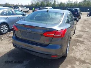 2017 Ford Focus SE with VIN 1FADP3F26HL229452, listed as a IAAI auction lot 41882192 with 83,499 mi miles. Bid and sale history available at carsss.com. Image 4.