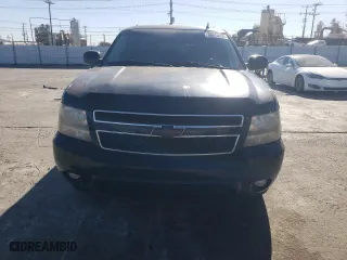 2009 Chevrolet Suburban LT w/2LT with VIN 1GNFK26369R272487, listed as a Copart auction lot 88810655 with 317,184 mi miles and Clean Title. Bid and sale history available at carsss.com. Image 5.