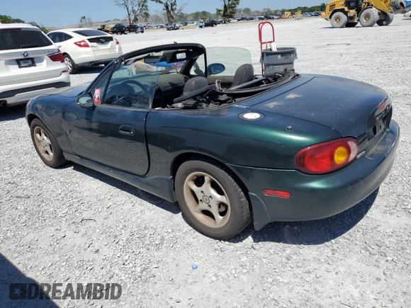1999 Mazda MX-5 Miata with VIN JM1NB3530X0118452, listed as a Copart auction lot 53337575 with 150,574 mi miles and Clean title. Bid and sale history available at DreamBid. Image 2.