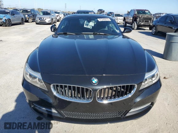 2015 BMW Z4 sDrive28i with VIN WBALL5C54FP557726, listed as a Copart auction lot 87249074 with 64,856 mi miles and Salvage Title. Bid and sale history available at carsss.com. Image 5.