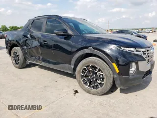 2022 Hyundai Santa Cruz SEL z VIN 5NTJC4AE3NH009820, wystawiony jako Copart lot #54860585 z przebiegiem 16 831 mil mil oraz Szkody całkowita. Historia ofert i sprzedaży dostępna na DreamBid. Obrazek 4.
