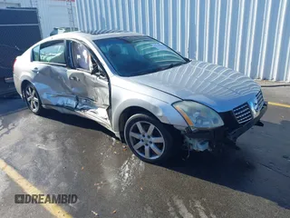 2004 Nissan Maxima SE with VIN 1N4BA41E14C909933, listed as a IAAI auction lot 41212022 with 338,407 mi miles. Bid and sale history available at carsss.com. Image 1.