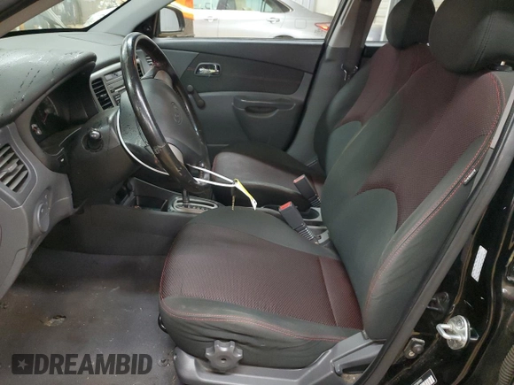 2009 Kia Rio LX with VIN KNADE243896580883, listed as a Copart auction lot 43735505 with 135,726 mi miles and Salvage Title. Bid and sale history available at carsss.com. Image 7.