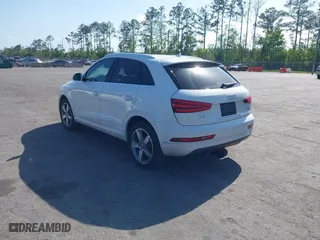 2015 Audi Q3 2.0T Premium Plus with VIN WA1EFCFS7FR010697, listed as a IAAI auction lot 41948566 with 167,001 mi miles. Bid and sale history available at carsss.com. Image 3.