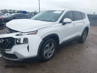 2023 Hyundai Santa Fe SE with VIN 5NMS14AJ3PH637561, listed as a IAAI auction lot 41905620 with 5,937 mi miles and . Bid and sale history available at DreamBid. Image 2.