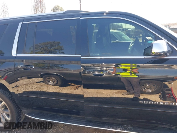 2019 Chevrolet Suburban LT with VIN 1GNSCJKC5KR360318, listed as a IAAI auction lot 41504344 with 82,997 mi miles and . Bid and sale history available at DreamBid. Image 13.