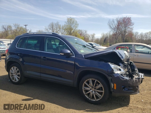 2011 Volkswagen Tiguan SE with VIN WVGBV7AX1BW563598, listed as a Copart auction lot 54215895 with 109,373 mi miles and Salvage Title. Bid and sale history available at DreamBid. Image 4.