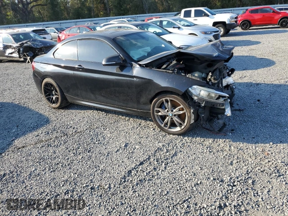 2015 BMW 2 Series M235i with VIN WBA1J7C56FV358181, listed as a Copart auction lot 89079445 with 0 mi miles and Salvage Title. Bid and sale history available at carsss.com. Image 1.
