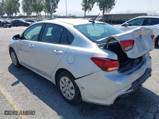2018 Kia Rio LX with VIN 3KPA24AB4JE086105, listed as a IAAI auction lot 42062323 with 128,289 mi miles. Bid and sale history available at carsss.com. Image 3.