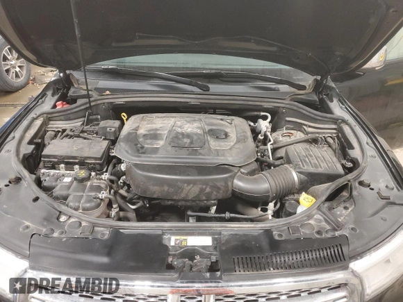 2018 Dodge Durango Citadel Anodized Platinum with VIN 1C4RDJEGXJC182877, listed as a Copart auction lot 83068134 with 84,545 mi miles and Salvage title. Bid and sale history available at DreamBid. Image 14.