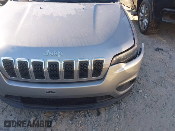 2019 Jeep Cherokee Latitude with VIN 1C4PJLCX6KD285305, listed as a IAAI auction lot 41670351 with 20,343 mi miles and . Bid and sale history available at DreamBid. Image 6.