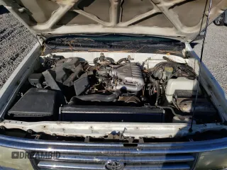 1995 Toyota T100 SR5 with VIN JT4VD12F1S0004904, listed as a Copart auction lot 75796804 with 182,011 mi miles and Salvage Title. Bid and sale history available at DreamBid. Image 11.