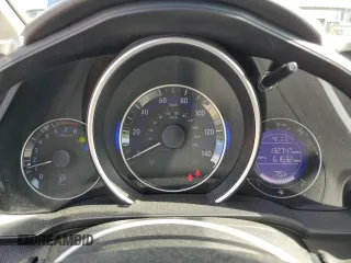 2015 Honda Fit EX-L z VIN 3HGGK5H88FM705989, wystawiony jako Copart lot #57143835 z przebiegiem 132 747 mil mil oraz Szkoda całkowita • Salvage title. Historia ofert i sprzedaży dostępna na DreamBid. Obrazek 9.