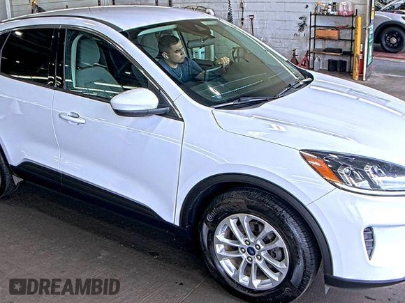2020 Ford Escape SE with VIN 1FMCU9G65LUB14830, listed as a IAAI auction lot 42626639 with 102,867 mi miles and . Bid and sale history available at DreamBid. Image 1.