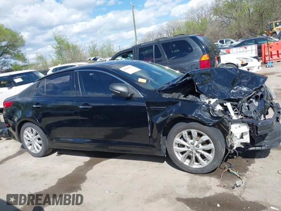 2015 Kia Optima EX with VIN 5XXGN4A79FG502953, listed as a IAAI auction lot 42009927 with 144,284 mi miles and . Bid and sale history available at DreamBid. Image 14.