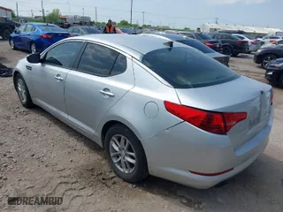 2012 Kia Optima LX with VIN 5XXGM4A77CG074198, listed as a IAAI auction lot 41927738 with 163,697 mi miles. Bid and sale history available at carsss.com. Image 3.