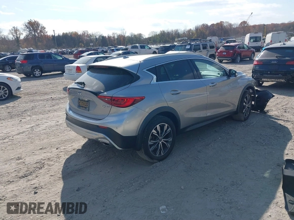2019 Infiniti QX30 Luxe with VIN SJKCH5CRXKA011966, listed as a IAAI auction lot 40800082 with 56,138 mi miles and . Bid and sale history available at DreamBid. Image 4.