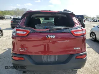 2014 Jeep Cherokee Altitude with VIN 1C4PJMCB0EW230724, listed as a Copart auction lot 49576945 with 133,392 mi miles and Salvage Title. Bid and sale history available at carsss.com. Image 6.