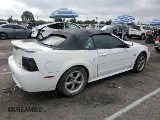 2004 Ford Mustang Deluxe z VIN 1FAFP44454F123067, wystawiony jako Copart lot #86784474 z przebiegiem 161 541 mil mil oraz Szkoda całkowita • Salvage title. Historia ofert i sprzedaży dostępna na DreamBid. Obrazek 3.