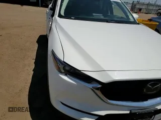 2018 Mazda CX-5 Grand Touring z VIN JM3KFBDM1J0473754, wystawiony jako Copart lot #60362245 z przebiegiem 72 792 mil mil oraz Szkoda całkowita • Salvage title. Historia ofert i sprzedaży dostępna na DreamBid. Obrazek 14.