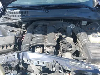 2005 Chrysler 300 with VIN 2C3JA53G25H167944, listed as a IAAI auction lot 41963114 with 196,635 mi miles. Bid and sale history available at carsss.com. Image 10.