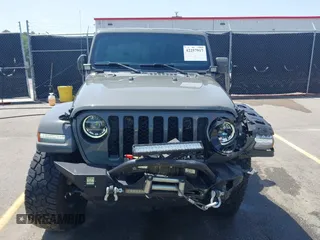2022 Jeep Gladiator High Altitude with VIN 1C6HJTFG5NL149751, listed as a IAAI auction lot 42257917 with 24,603 mi miles and . Bid and sale history available at DreamBid. Image 12.