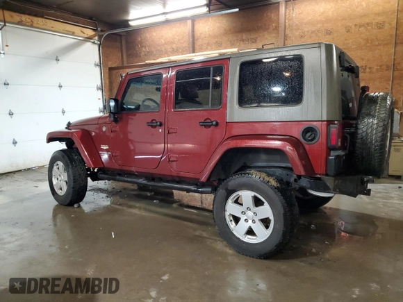 2007 Jeep Wrangler Unlimited Sahara with VIN 1J4GA59197L104784, listed as a Copart auction lot 56700205 with 156,382 mi miles and Salvage title. Bid and sale history available at DreamBid. Image 2.