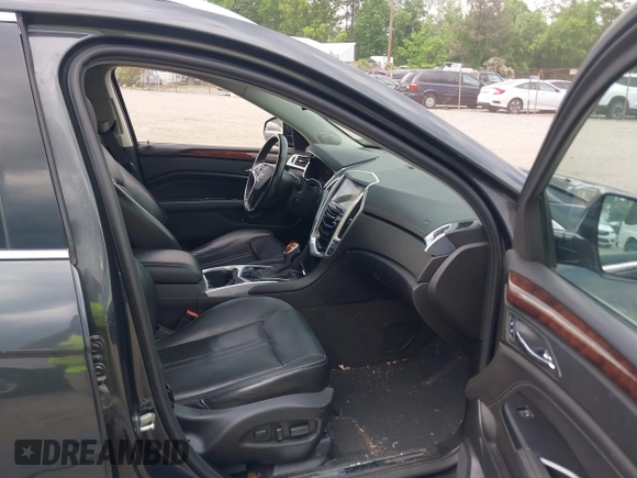 2014 Cadillac SRX Luxury Collection z VIN 3GYFNEE38ES626949, wystawiony jako IAAI lot #42194679 z przebiegiem 173 303 mil mil oraz . Historia ofert i sprzedaży dostępna na DreamBid. Obrazek 5.