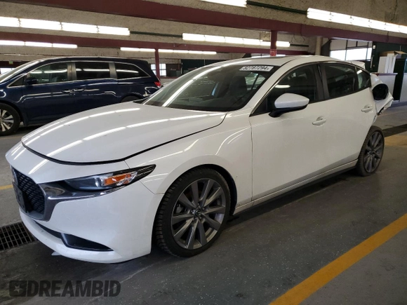 2021 Mazda 3 Preferred with VIN 3MZBPBCM2MM208721, listed as a Copart auction lot 82787294 with 96,891 mi miles and Salvage Title. Bid and sale history available at DreamBid. Image 1.