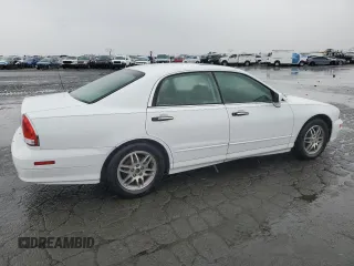 2003 Mitsubishi Diamante LS z VIN 6MMAP67P43T002798, wystawiony jako Copart lot #80368974 z przebiegiem 134 099 mil mil oraz Tytuł czysty. Historia ofert i sprzedaży dostępna na DreamBid. Obrazek 3.