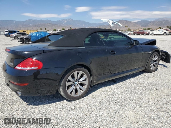 2009 BMW 6 Series 650i with VIN WBAEB53569C224337, listed as a Copart auction lot 68148974 with 75,057 mi miles and Salvage Title. Bid and sale history available at carsss.com. Image 3.