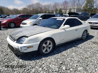 1998 Honda Prelude with VIN JHMBB6145WC009435, listed as a Copart auction lot 54256295 with 208,067 mi miles and Clean Title. Bid and sale history available at DreamBid. Image 1.