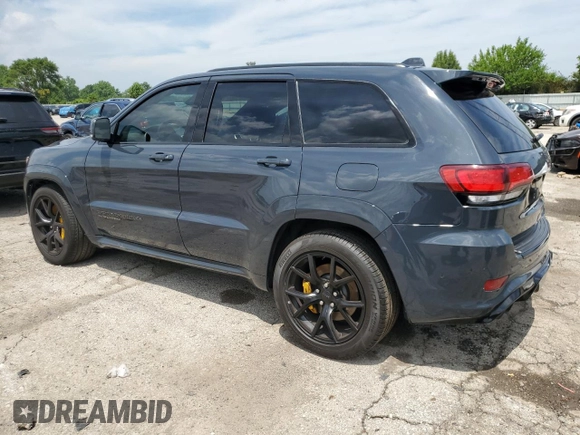 2018 Jeep Grand Cherokee Trackhawk with VIN 1C4RJFN99JC309254, listed as a Copart auction lot 64061615 with 104,558 mi miles and Clean title. Bid and sale history available at DreamBid. Image 2.