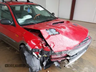 1999 Subaru Impreza Outback Special Sports z VIN JF1GF4854XH815209, wystawiony jako IAAI lot #42235555 z przebiegiem 294 867 mil mil oraz . Historia ofert i sprzedaży dostępna na DreamBid. Obrazek 6.