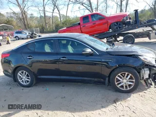 2013 Kia Optima LX with VIN 5XXGM4A74DG101584, listed as a IAAI auction lot 41835179 with 123,689 mi miles. Bid and sale history available at carsss.com. Image 13.