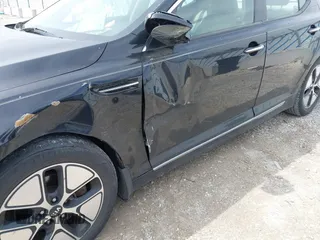 2012 Kia Optima Hybrid with VIN KNAGM4AD5C5017635, listed as a IAAI auction lot 42214181 with 159,599 mi miles. Bid and sale history available at carsss.com. Image 6.