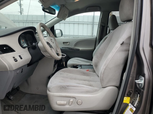 2012 Toyota Sienna LE AAS with VIN 5TDKK3DC0CS242667, listed as a Copart auction lot 65041005 with 196,322 mi miles and Clean title. Bid and sale history available at DreamBid. Image 7.