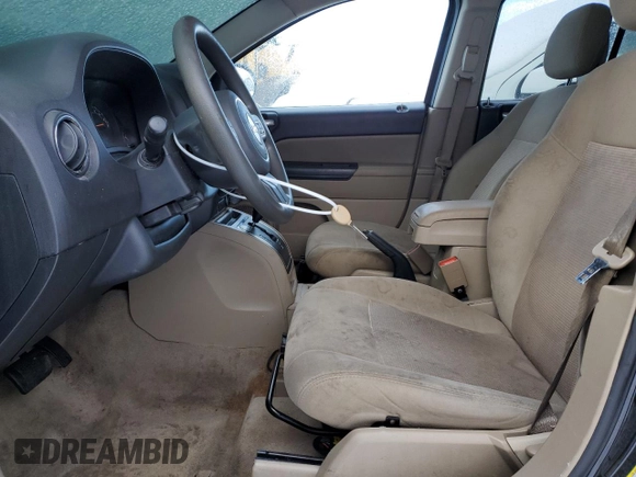 2014 Jeep Compass Sport with VIN 1C4NJCBA7ED925577, listed as a Copart auction lot 83315104 with 139,078 mi miles and Salvage Title. Bid and sale history available at carsss.com. Image 7.