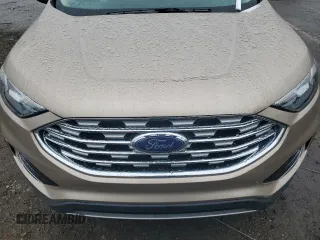 2021 Ford Edge SEL z VIN 2FMPK4J96MBA36322, wystawiony jako Copart lot #56851975 z przebiegiem 10 073 mil mil oraz Czysty tytuł • Clean title. Historia ofert i sprzedaży dostępna na DreamBid. Obrazek 12.