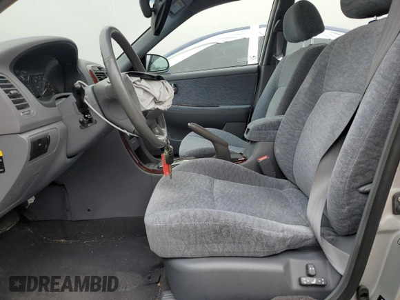2005 Kia Optima LX z VIN KNAGD128055433689, wystawiony jako Copart lot #46909305 z przebiegiem 27 609 mil mil oraz Szkoda całkowita • Salvage title. Historia ofert i sprzedaży dostępna na DreamBid. Obrazek 7.