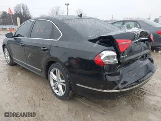 2016 Volkswagen Passat 1.8T SE w/Technology with VIN 1VWBS7A32GC050411, listed as a IAAI auction lot 41729648 with 102,574 mi miles. Bid and sale history available at carsss.com. Image 3.