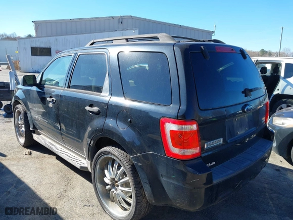 2009 Ford Escape XLT with VIN 1FMCU93G49KD15671, listed as a IAAI auction lot 41751527 with 208,697 mi miles. Bid and sale history available at carsss.com. Image 3.