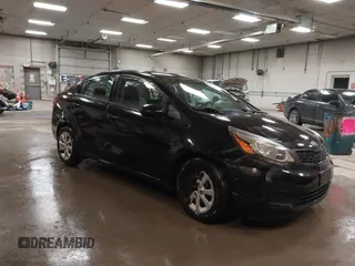 2014 Kia Rio LX with VIN KNADM4A31E6404206, listed as a IAAI auction lot 41543090 with 70,563 mi miles and . Bid and sale history available at DreamBid. Image 1.