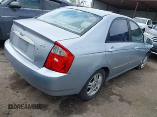 2004 Kia Spectra LX z VIN KNAFE121345017467, wystawiony jako IAAI lot #41911311 z przebiegiem 221 086 mil mil oraz . Historia ofert i sprzedaży dostępna na DreamBid. Obrazek 4.