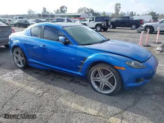 2004 Mazda RX-8 with VIN JM1FE173740125035, listed as a IAAI auction lot 41884059 with 102,881 mi miles. Bid and sale history available at carsss.com. Image 1.