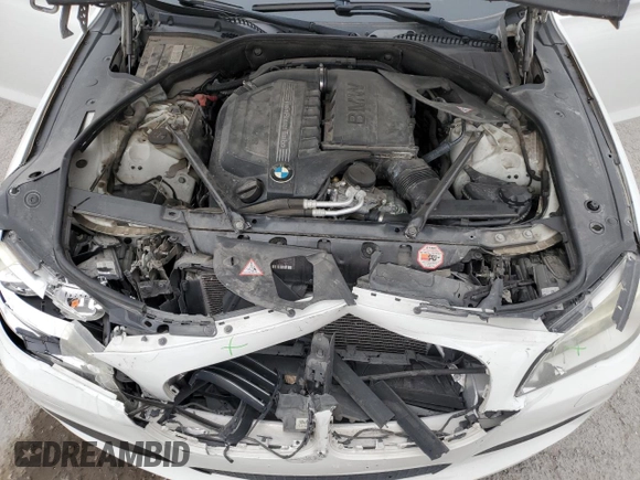 2013 BMW 7 Series 740i with VIN WBAYA6C55DC995290, listed as a Copart auction lot 82022284 with 128,882 mi miles and Salvage Title. Bid and sale history available at carsss.com. Image 11.