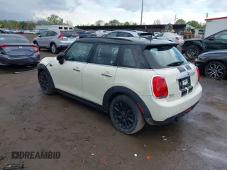 2015 MINI Hardtop 4 Door with VIN WMWXS5C52FT831291, listed as a IAAI auction lot 42179801 with 63,261 mi miles and . Bid and sale history available at DreamBid. Image 3.